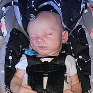 Jack joined the competition — help win amazing prizes! baby, blanket_edge, buckle, camera_watermark, car_seat, cheek, closed_eyes, ear, hand, harness, headrest, indoors, infant, newborn, pacifier, patterned_fabric, portrait, skin, sleeping, white_onesie