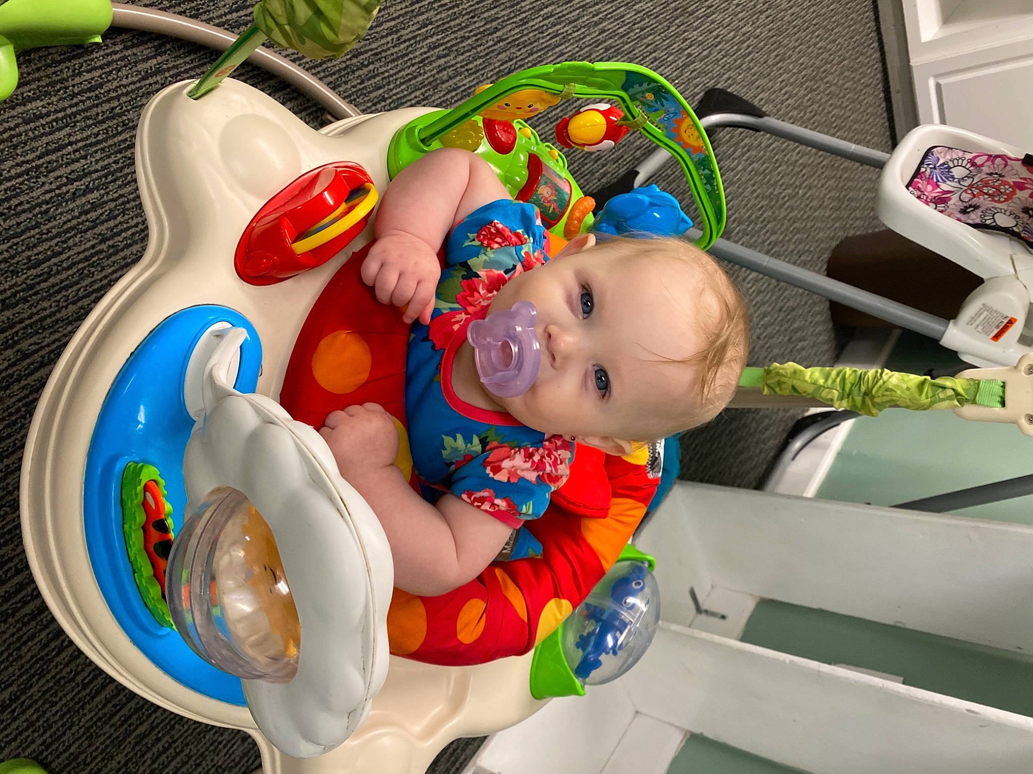 Chevelle is registered to the contest to win money with this photo: baby, baby_products, baby_safety, baby_toddler_clothing, baby_toys, child, circle, fictional_character, fun, happy, person, plastic, play, room, smile, stuffed_toy, toddler, toy, toy_vehicle