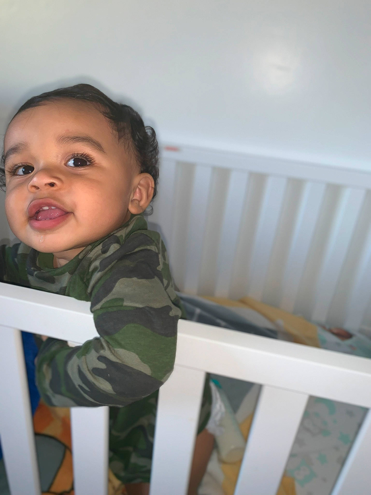 Kalel is registered to the contest to win money with this photo: baby, baby_products, baby_safety, bed, cheek, child, eye, furniture, infant_bed, iris, nursery, person, product, room, skin, smile, standing, toddler