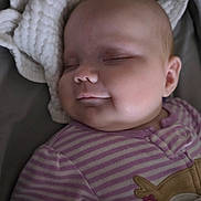 Lily joined the competition — help win amazing prizes! baby, blanket, child, cozy, cute, ear, face, head, indoors, infant, nap, onesie, peaceful, portrait, resting, skin, sleeping, smile, soft, striped_clothing
