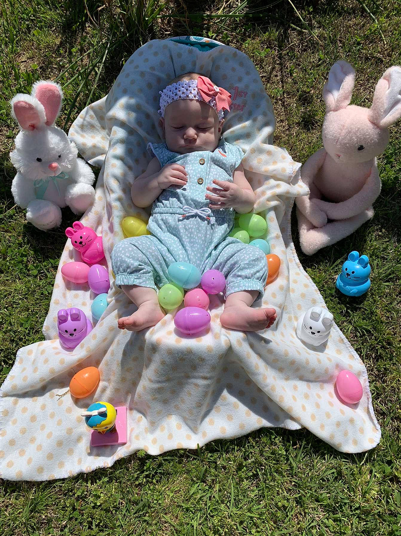 Kaileigh is registered to the contest to win money with this photo: art, child, easter_bunny, event, fun, games, garden, grass, happy, lawn_ornament, leisure, mammal, person, pink, plant, play, recreation, sculpture, sitting, spring