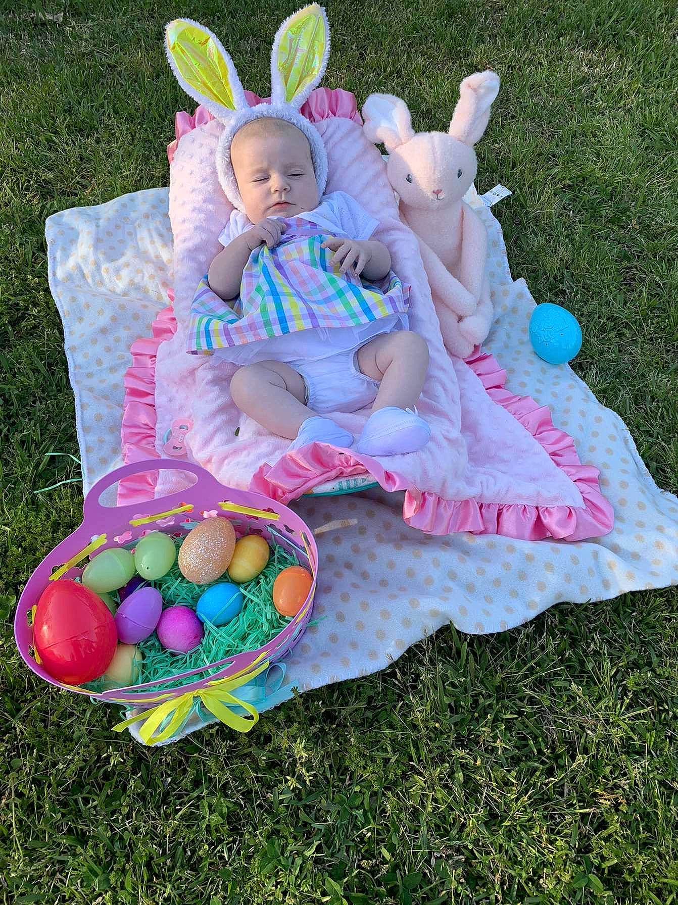 Kaileigh is registered to the contest to win money with this photo: baby_toddler_clothing, ball, basket, child, easter, easter_egg, event, fun, grass, happy, leisure, outdoor_recreation, pattern, person, pink, play, recreation, sitting, sports_toy, sunglasses