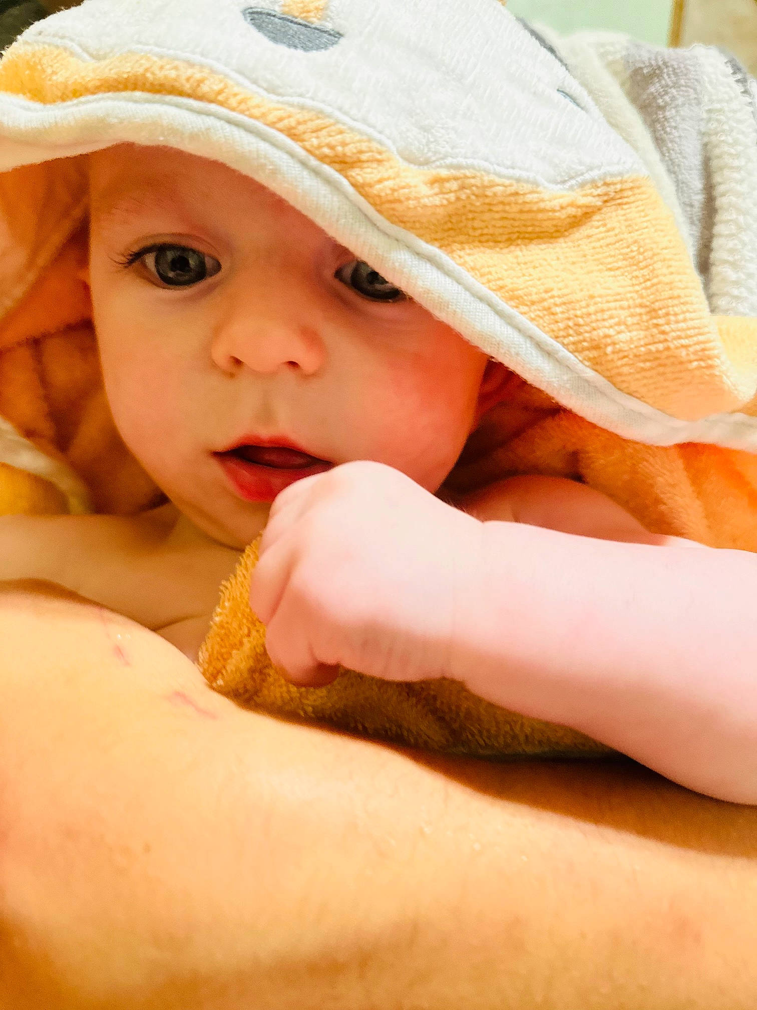 Karsyn is registered to the contest to win money with this photo: baby, cap, child, close_up, comfort, elbow, eye, eyelash, finger, gesture, grass, happy, hat, headgear, headwear, lip, nose, person, skin, sun_hat