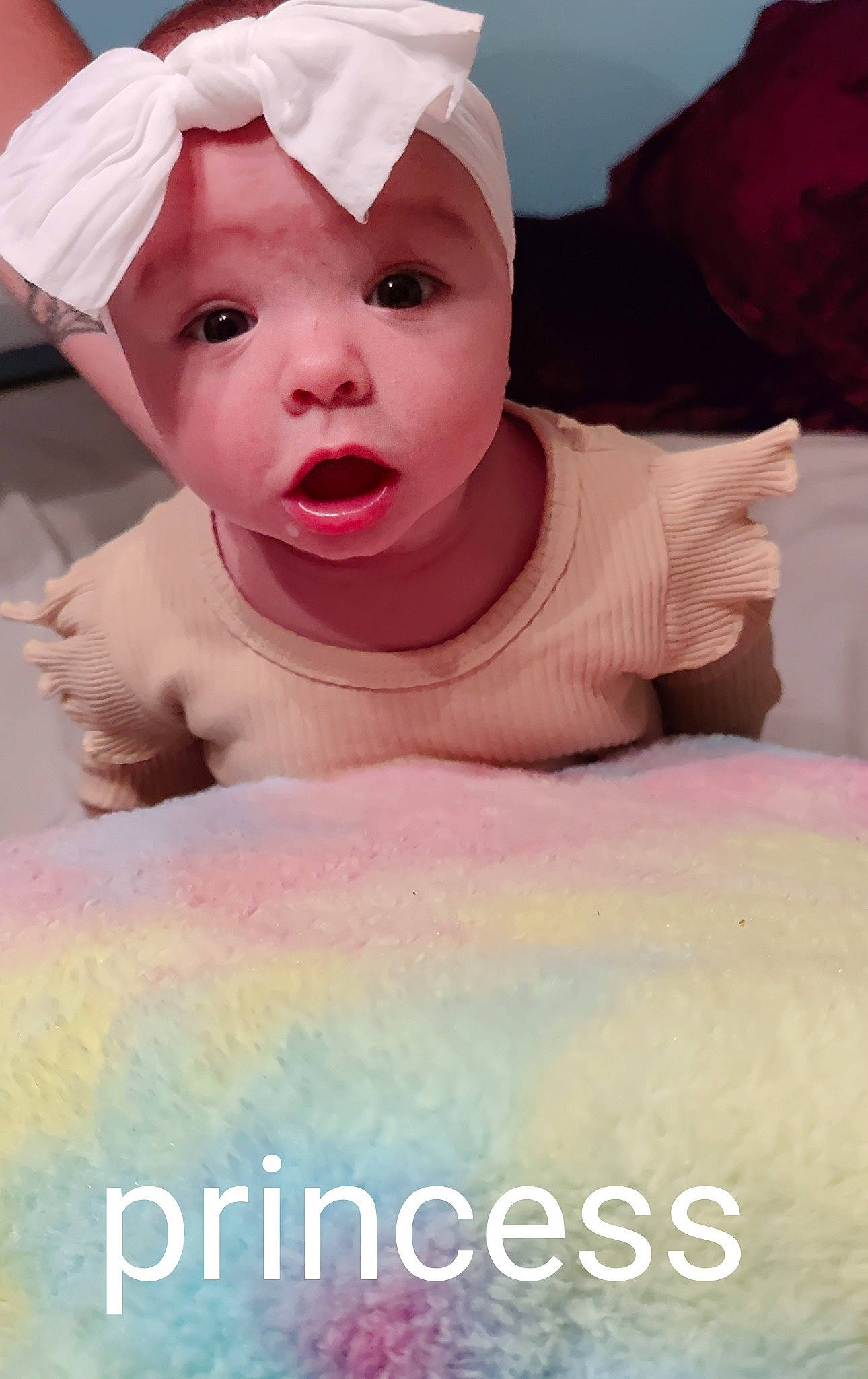 Aviana is registered to the contest to win money with this photo: baby, baby_toddler_clothing, beauty, cap, child, chin, eyebrow, facial_expression, font, fun, happy, lip, mouth, peach, person, photo_caption, photograph, pink, skin, sweetness