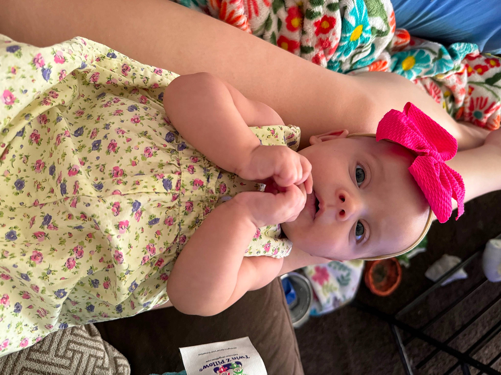 Arya is registered to the contest to win money with this photo: baby, baby_products, baby_toddler_clothing, cheek, child, eye, eyelash, fashion_accessory, happy, hat, human_body, human_leg, lip, mouth, nail, pattern, person, pink, skin, thigh
