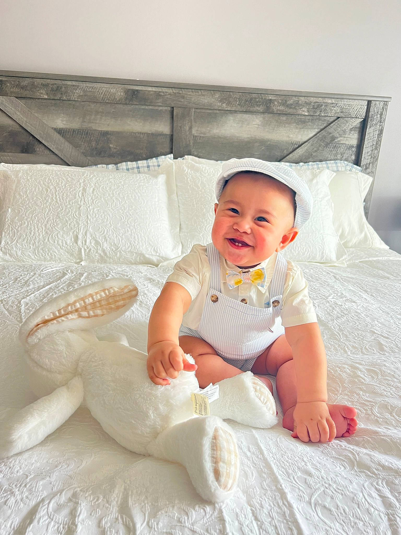 Anthony joined the competition — help win amazing prizes! baby, baby_toddler_clothing, bed, bedding, child, comfort, couch, fashion_accessory, flooring, hairstyle, happy, joy, linens, pattern, person, pillow, room, sitting, sleeve, smile