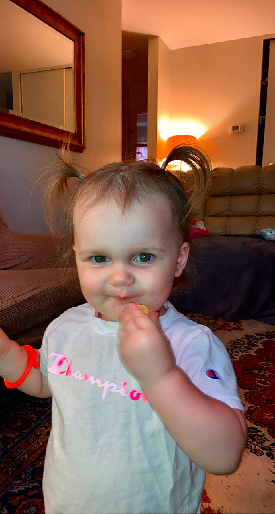 Nicole is registered to the contest to win money with this photo: arm, baby, baby_toddler_clothing, cheek, child, comfort, couch, ear, flooring, fun, hair, hairstyle, happy, head, mirror, person, picture_frame, skin, smile, t_shirt