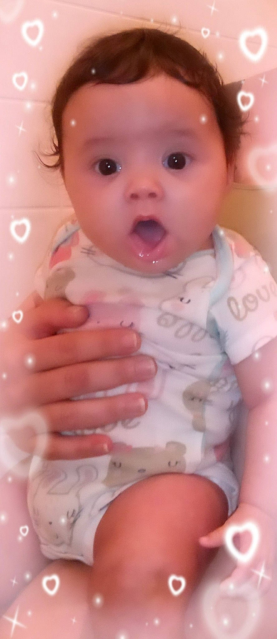 Billie joined the competition — help win amazing prizes! arm, baby, baby_toddler_clothing, cheek, eye, eyelash, face, finger, human_body, iris, lip, mouth, nose, person, pink, skin, sleeve, stomach, surprise, thumb