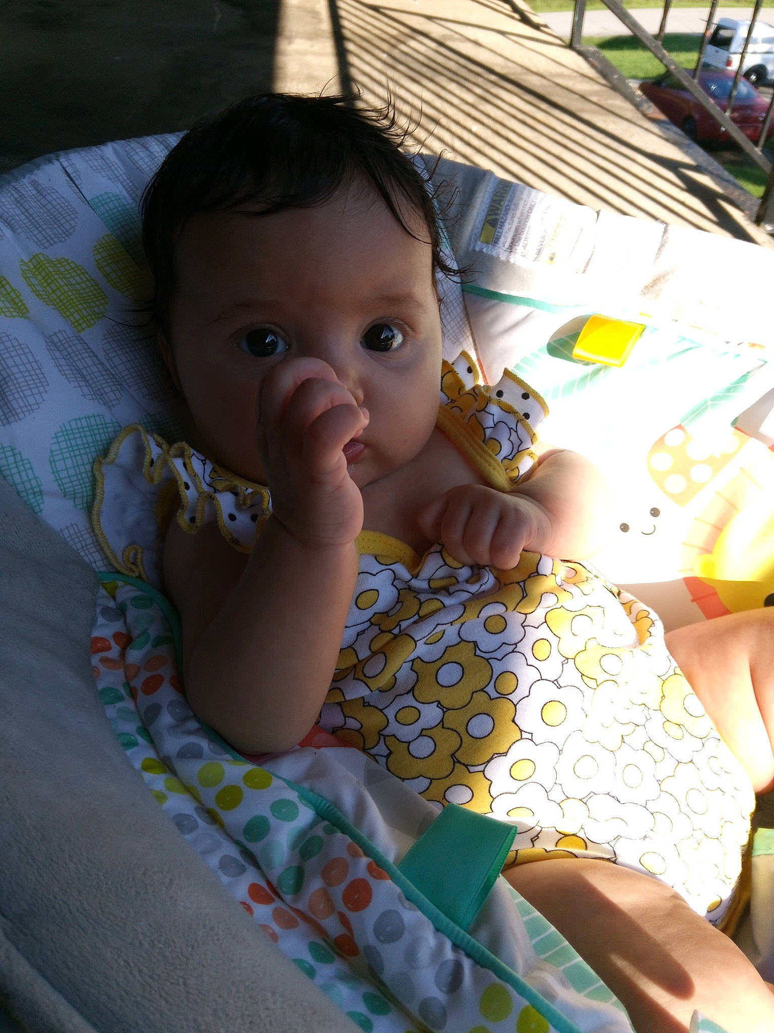 Billie is registered to the contest to win money with this photo: baby, baby_toddler_clothing, cheek, child, comfort, couch, dress, eye, facial_expression, fun, grass, hairstyle, happy, iris, mammal, pattern, person, room, sitting, skin