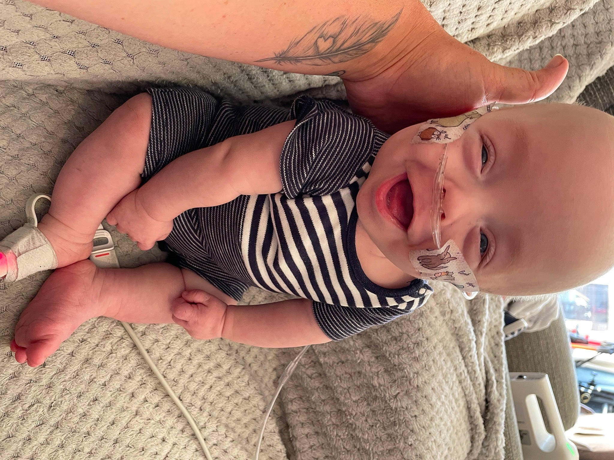 Chester joined the competition — help win amazing prizes! arm, baby, baby_toddler_clothing, cheek, dress, eye, finger, glasses, hand, head, human_body, lip, mammal, mouth, neck, nose, person, product, skin, sleeve