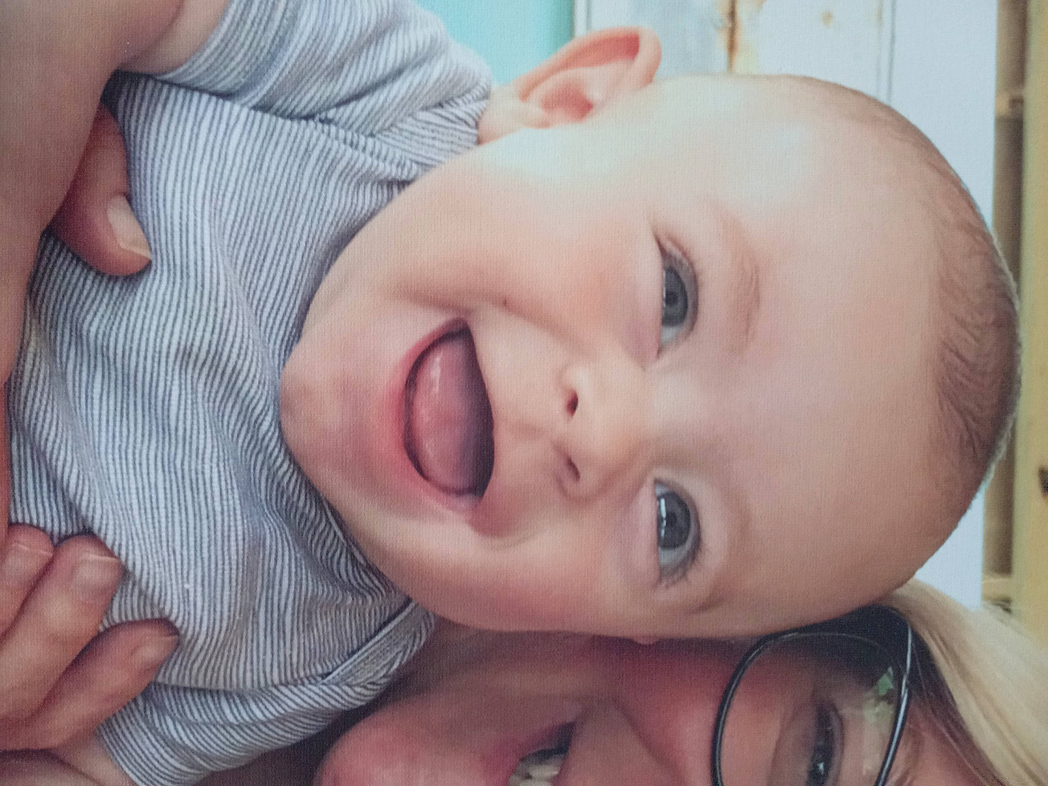 Fisher is registered to the contest to win money with this photo: baby, cheek, chin, ear, eye, eyebrow, eyelash, facial_expression, finger, forehead, gesture, hand, happy, iris, lip, mouth, neck, nose, person, skin