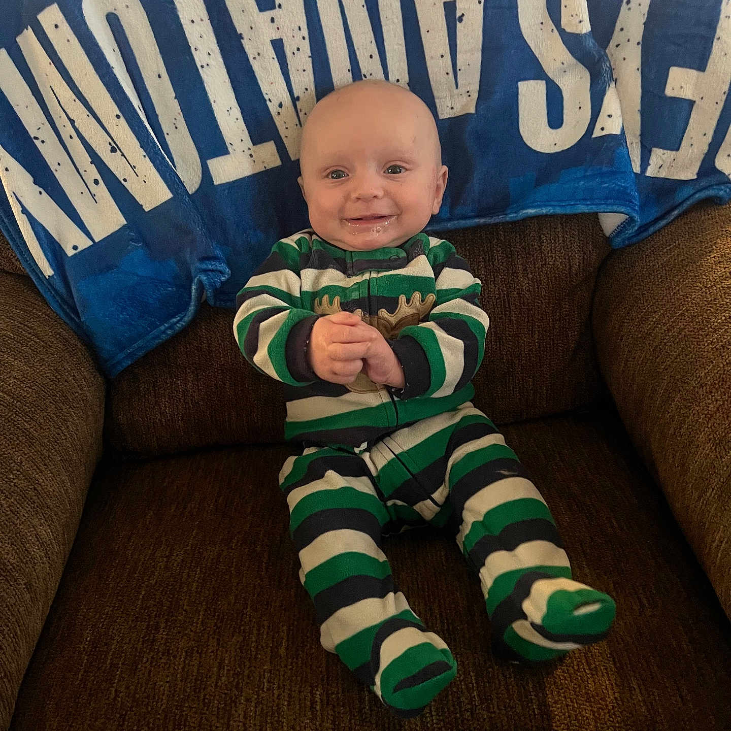 Wesson is registered to the contest to win money with this photo: accessories, architecture, armchair, baby, blanket, blonde, bodypart, building, chair, clothing, costume, couch, cushion, cutlery, face, finger, footwear, furniture, glasses, glove