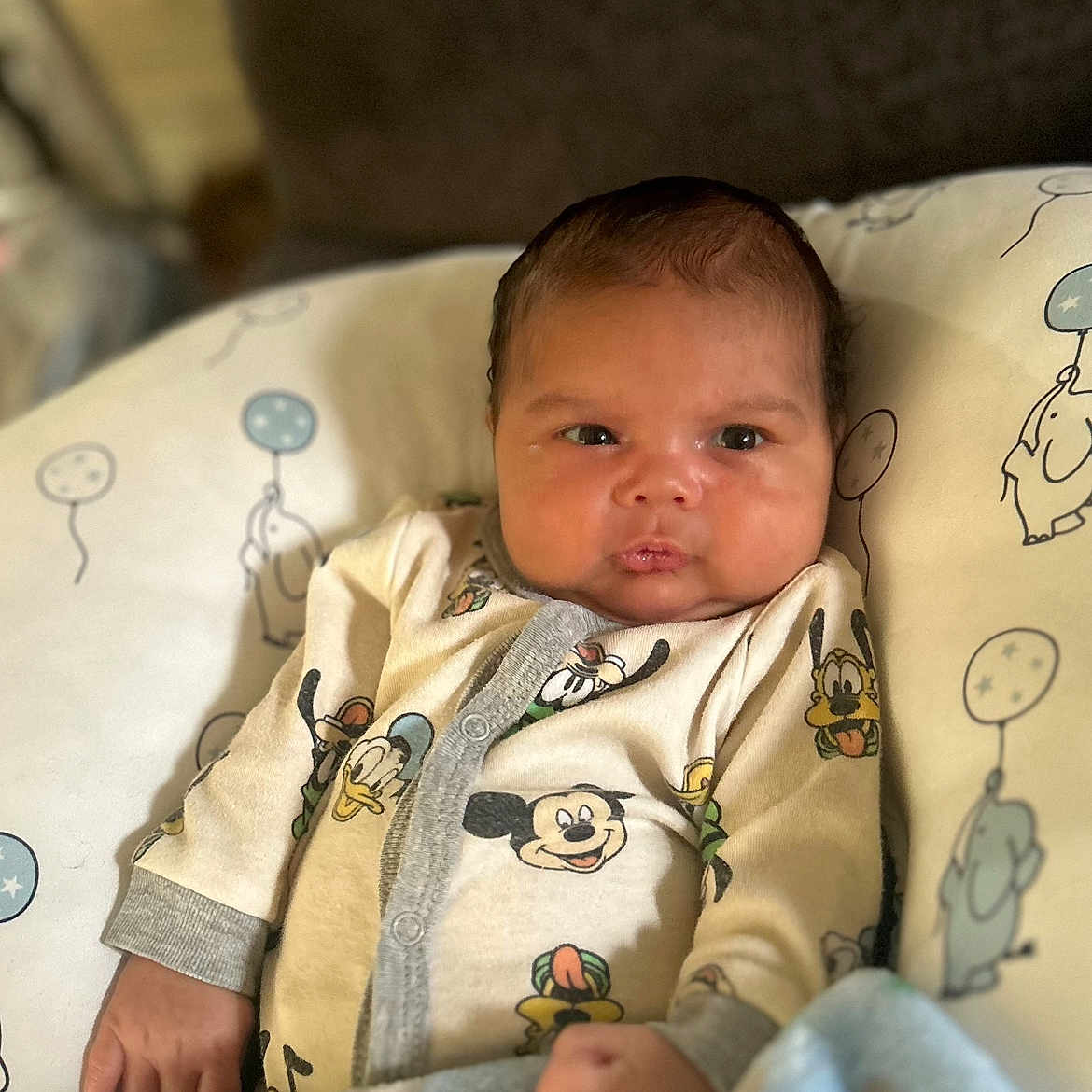 Ramier is registered to the contest to win money with this photo: architecture, baby, bed, blanket, bodypart, building, couch, cushion, face, finger, furniture, hand, head, homedecor, hospital, newborn, person, photography, portrait, quilt