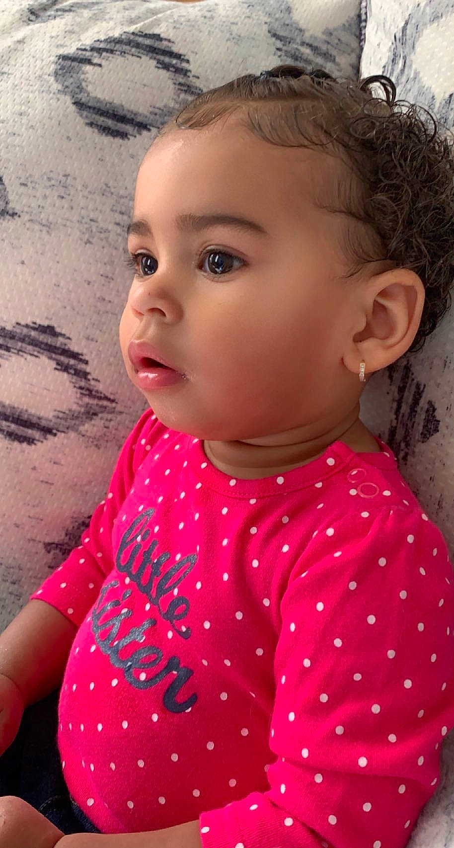 Giana is registered to the contest to win money with this photo: baby_toddler_clothing, child, chin, cool, dress, eyelash, facial_expression, hairstyle, happy, head, lip, neck, nose, organ, pattern, person, pink, skin, sleeve, toddler