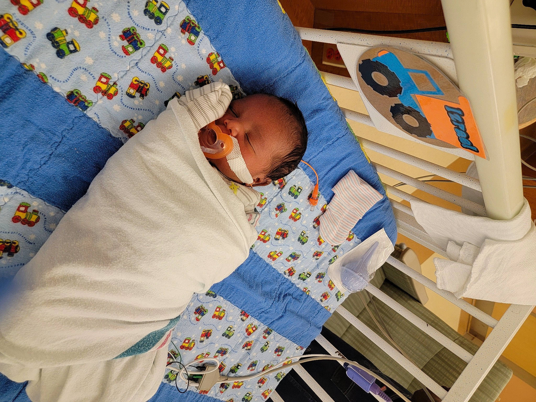 Izrael joined the competition — help win amazing prizes! azure, baby, baby_products, baby_sleeping, baby_toddler_clothing, bedtime, blue, child, comfort, couch, flooring, glasses, leisure, linens, pattern, person, product, room, sunglasses, toddler