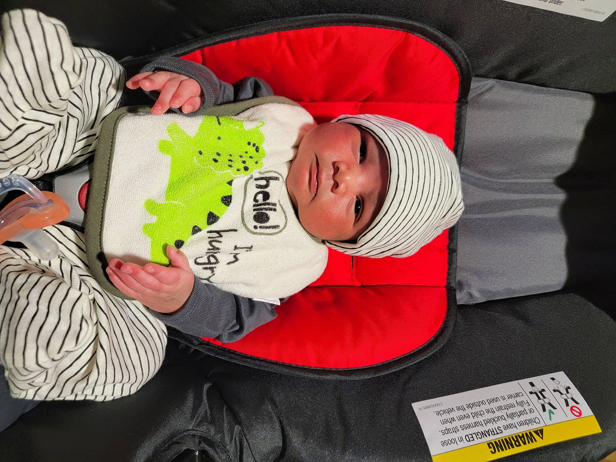 Izrael is registered to the contest to win money with this photo: baby, baby_products, baby_toddler_clothing, carmine, child, comfort, event, fun, hat, headwear, lap, mammal, nap, person, room, sitting, sleep, sleeve, t_shirt, toddler