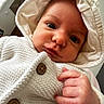 baby, infant, hoodie, knitted_clothing, white, cute, face, hand, indoor, portrait, cozy, child, newborn, button, warm, window, light, skin, candid, expression