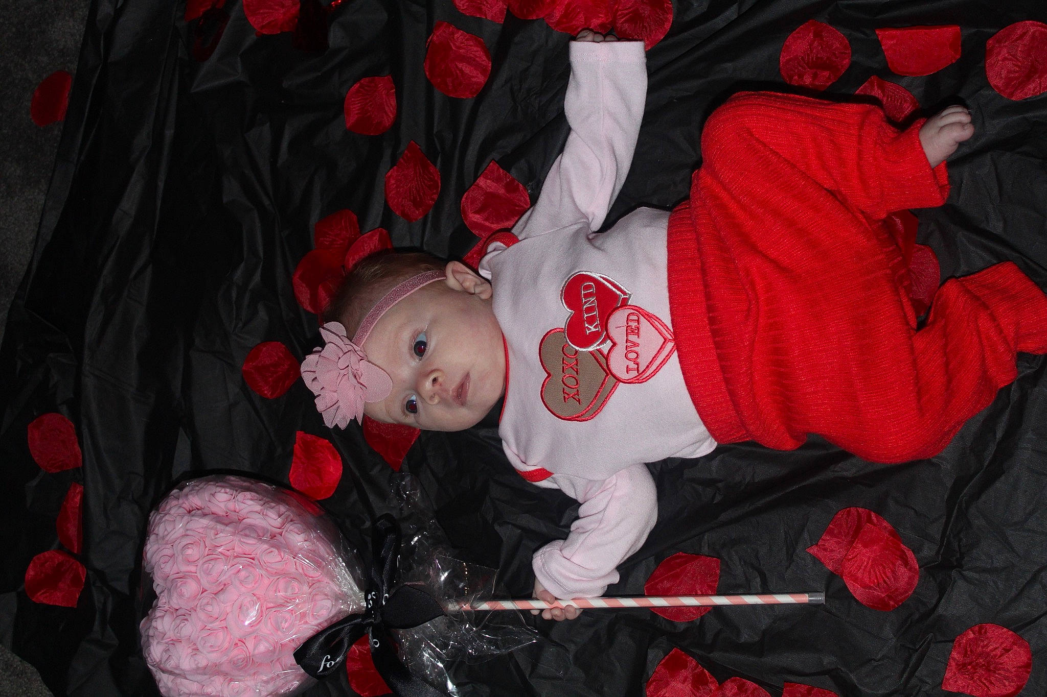 Ember joined the competition — help win amazing prizes! baby, baby_products, baby_toddler_clothing, carmine, child, christmas_eve, costume, event, fictional_character, fun, headwear, human_body, lap, person, pink, red, santa_claus, sleeve, textile, toddler