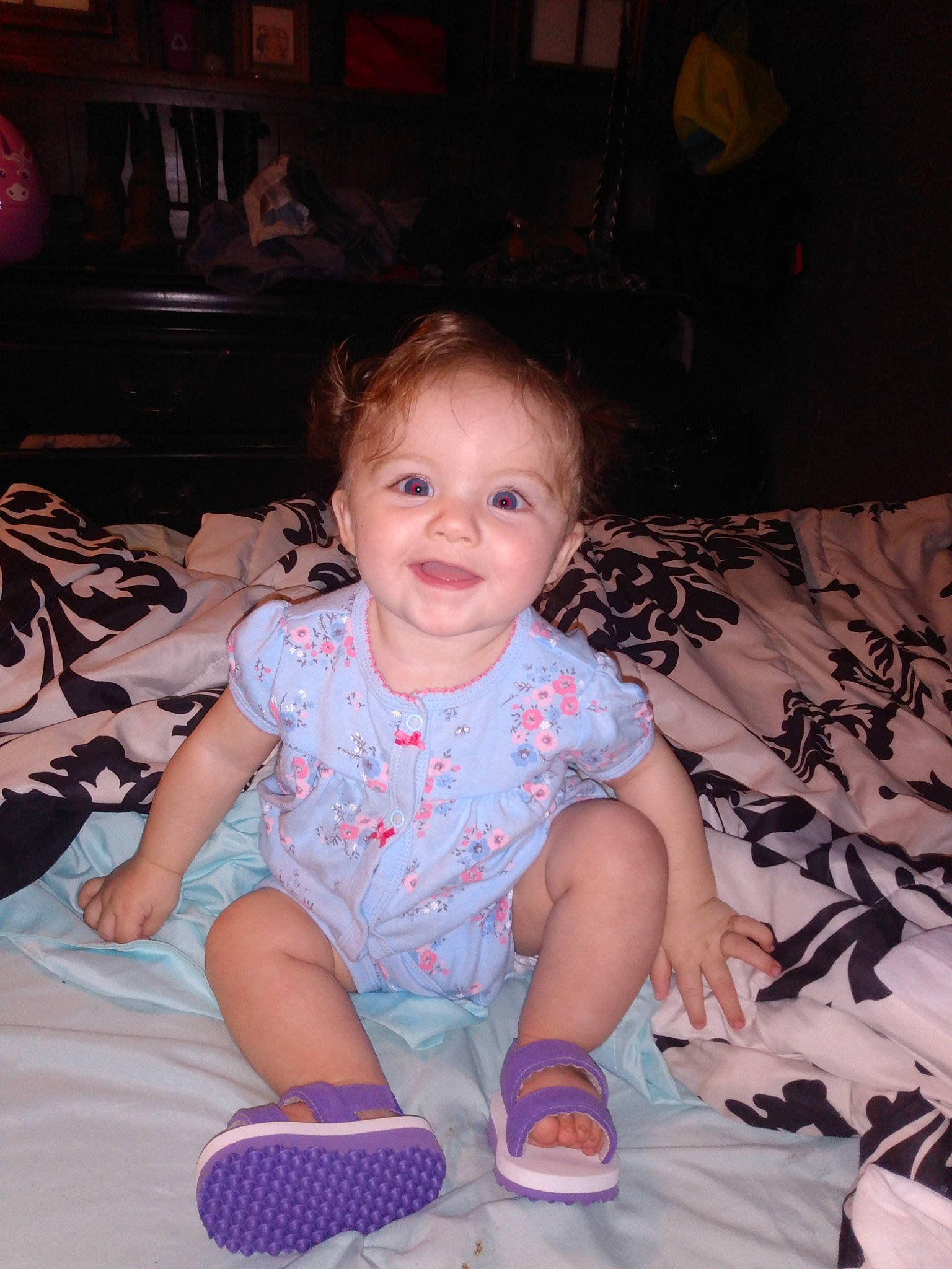 Kenzleigh is registered to the contest to win money with this photo: baby, cheek, child, eye, face, family, fun, head, iris, joy, leg, people, person, pink, sitting, skin, smile, toddler, vacation