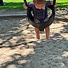 barefoot, blue_chair, casual_clothing, chains, child, curious, daytime, fun, grass, nature, outdoor, park, people, playground, recreation, sand, shadow, sunlight, swing, toddler