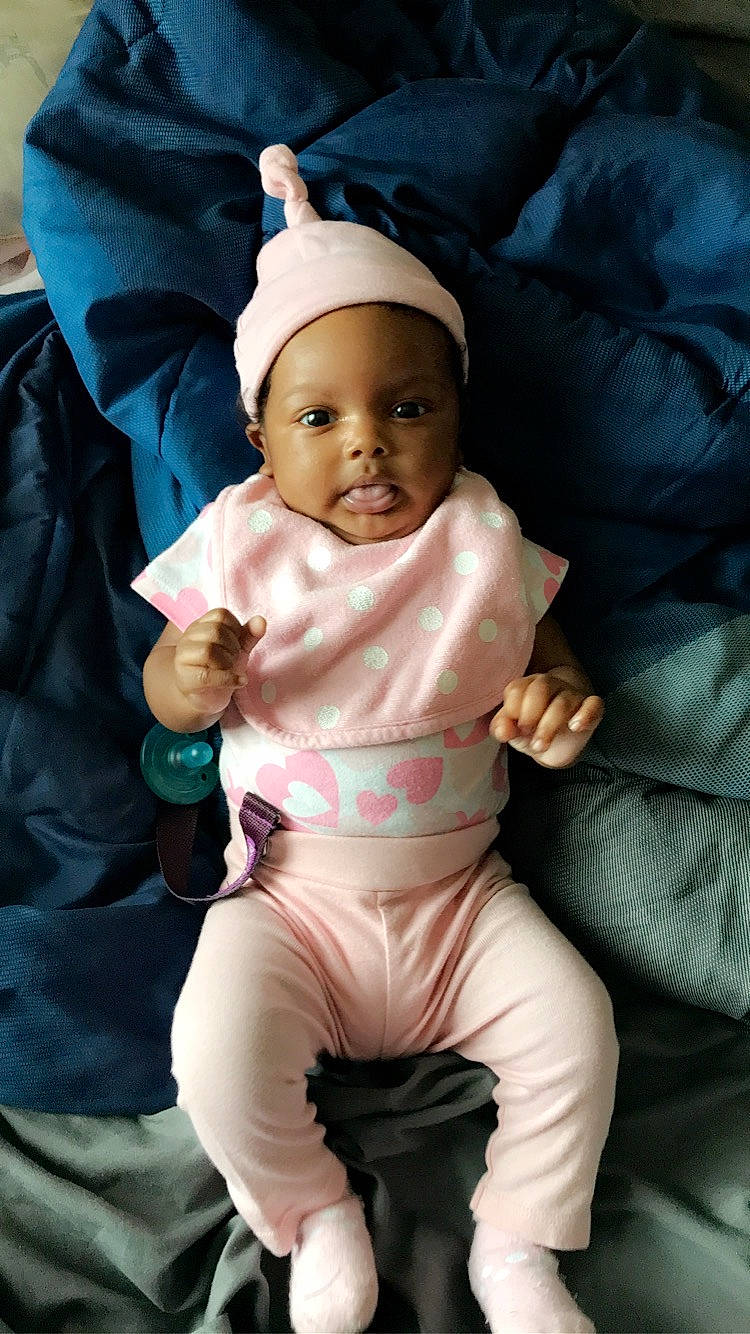 Harmoni is registered to the contest to win money with this photo: baby, cheek, child, person, sitting, smile, toddler