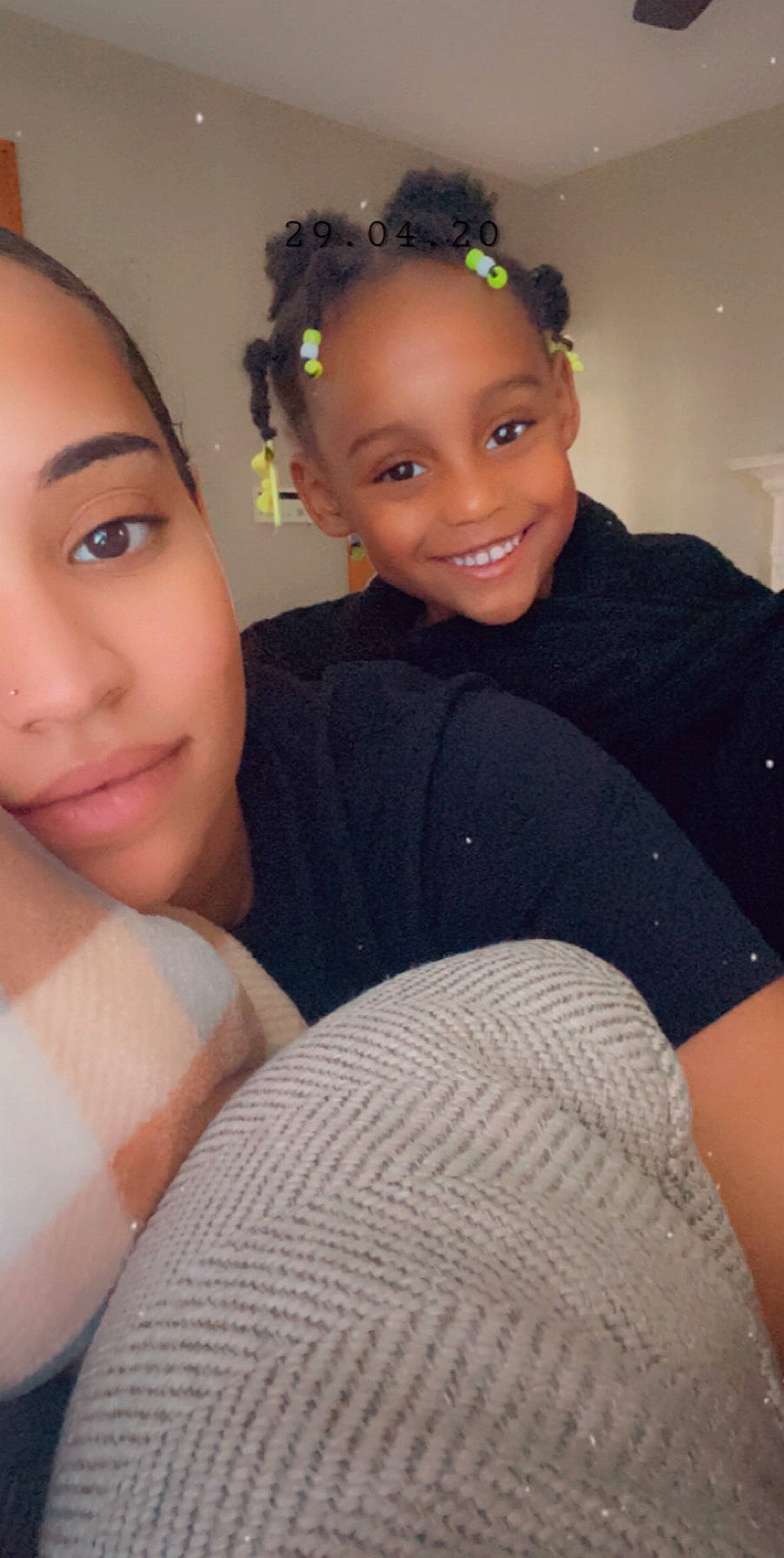 London is registered to the contest to win money with this photo: beauty, black_hair, child, cornrows, eyebrow, face, forehead, fun, hair, hairstyle, head, joy, lip, long_hair, nose, person, photography, selfie, skin, smile