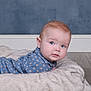 Luca is registered to the contest to win money with this photo: baby, blanket, blue_eyes, blue_wall, child, clothing, curious, face, floor, head, indoor, infant, lying_down, patterned_shirt, plush, portrait, red_hair, skin, soft_texture, young