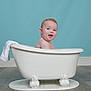 baby, bath_time, bathtub, blue_wall, child, clawfoot_tub, clean, cute, face, floor, happy, head, indoor, plumbing_fixture, portrait, sitting, skin, smiling, towel, waterless