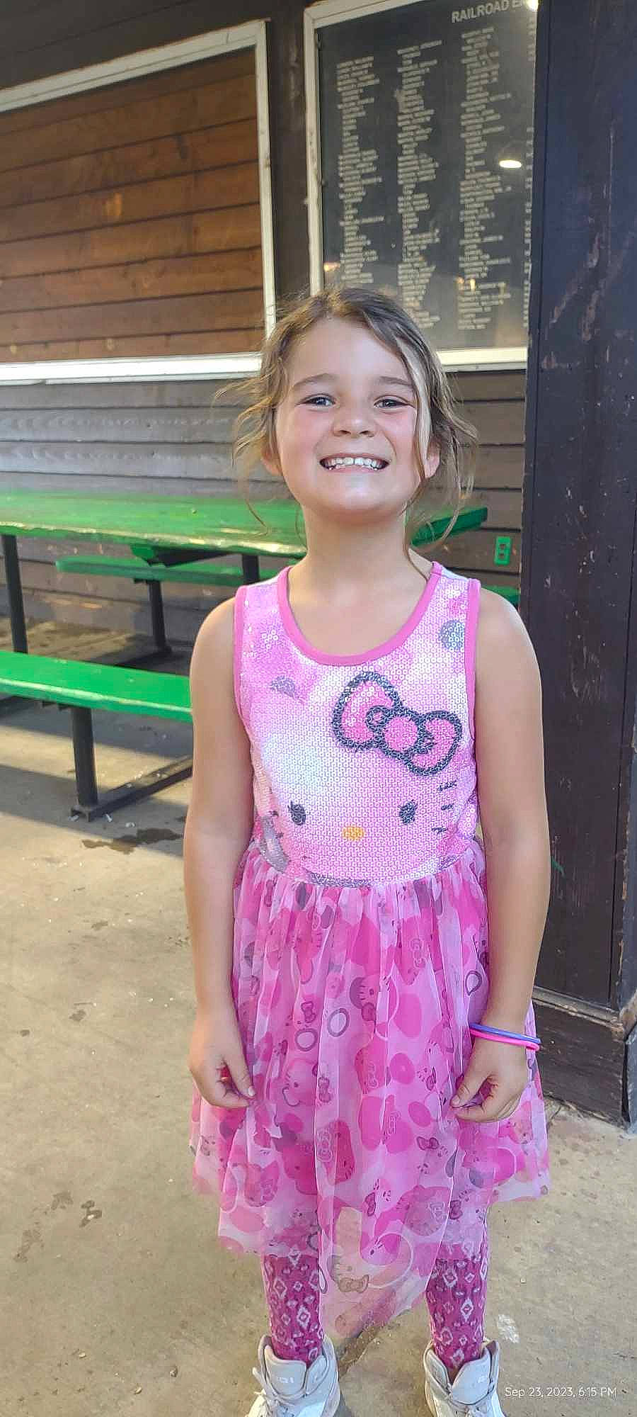 Josie joined the competition — help win amazing prizes! baby_toddler_clothing, bench, child, cocktail_dress, day_dress, dress, electric_blue, embellishment, fashion_design, fun, happy, joy, leisure, magenta, one_piece_garment, pattern, person, pink, sleeve, smile