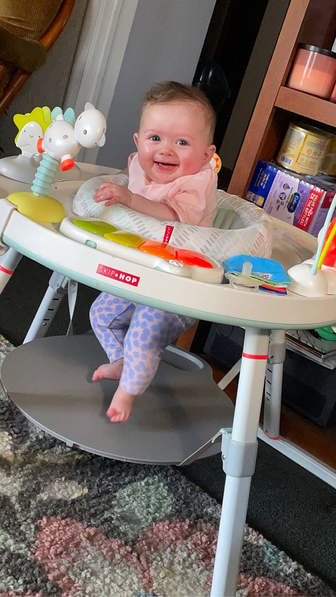 Ainsley is registered to the contest to win money with this photo: baby, baby_products, baby_safety, baby_toddler_clothing, baby_toys, chair, child, fun, happy, joy, leisure, person, plastic, play, room, shorts, sitting, smile, t_shirt, toddler