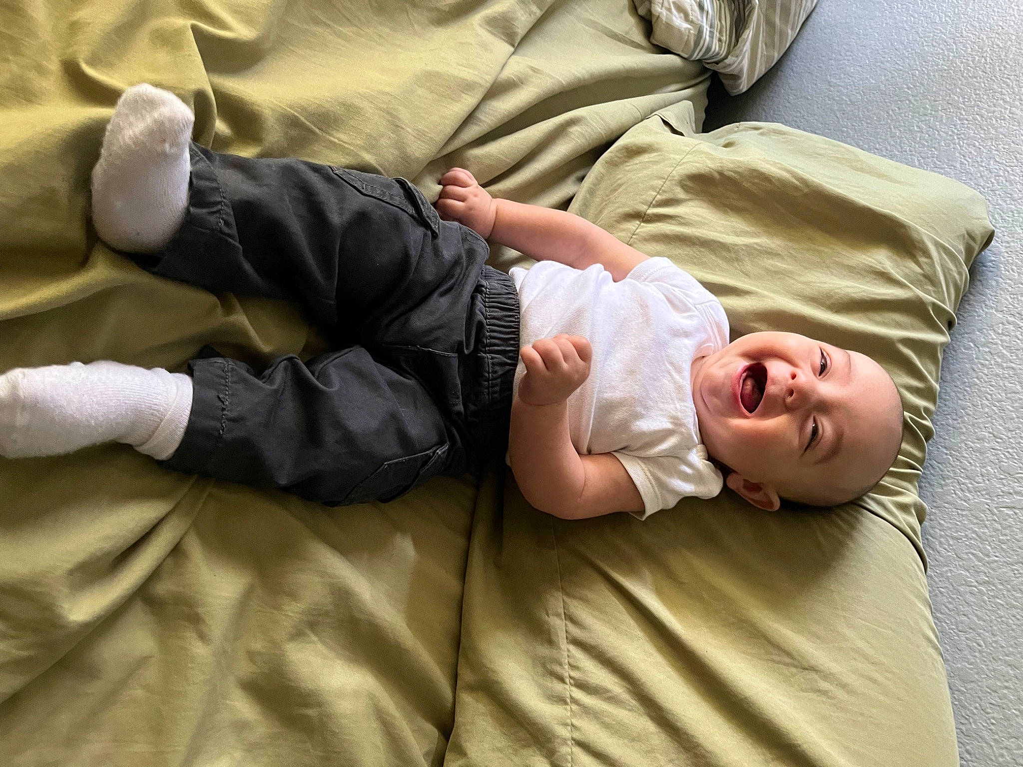 Arturo joined the competition — help win amazing prizes! arm, baby, baby_sleeping, baby_toddler_clothing, child, comfort, elbow, finger, foot, gesture, hand, head, human_body, human_leg, joint, knee, leg, linens, person, sitting