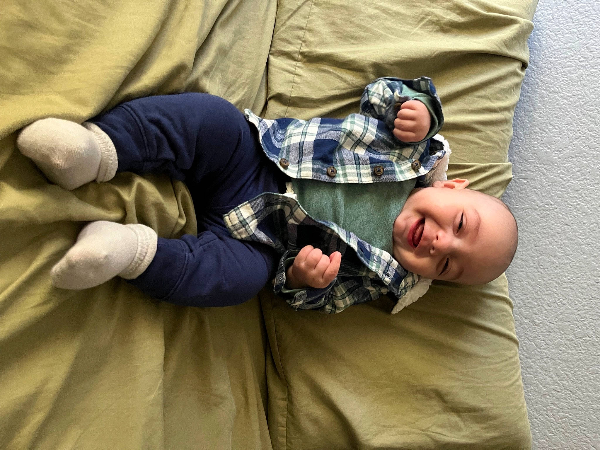 Arturo joined the competition — help win amazing prizes! baby, child, comfort, elbow, flooring, foot, fun, gesture, human_leg, joint, joy, knee, linens, nap, pattern, person, personal_protective_equipment, room, sitting, thigh