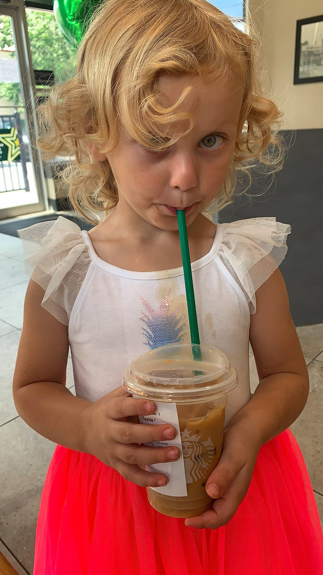 Avonna is registered to the contest to win money with this photo: active_tank, blond, brown_hair, chest, child, drink, drinking, drinkware, eyelash, fun, hair, hairstyle, happy, jewellery, person, picture_frame, sleeveless_shirt, summer, surfer_hair, toddler