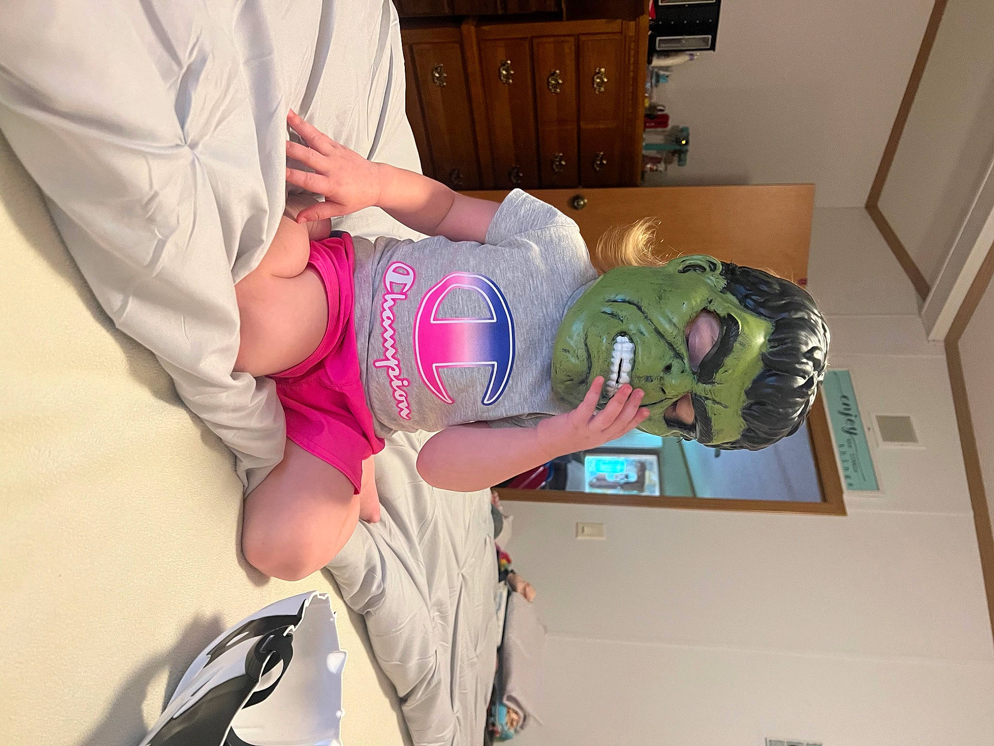 Mckinley joined the competition — help win amazing prizes! cabinetry, chest, chest_of_drawers, drawer, elbow, fun, gesture, human_leg, joint, knee, leg, luggage_and_bags, person, purple, room, shelf, textile, thigh, trunk, waist