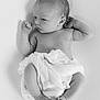 baby, back, bodypart, diaper, face, finger, hand, happy, head, newborn, person, photography, portrait, sleeping, smile, towel, white