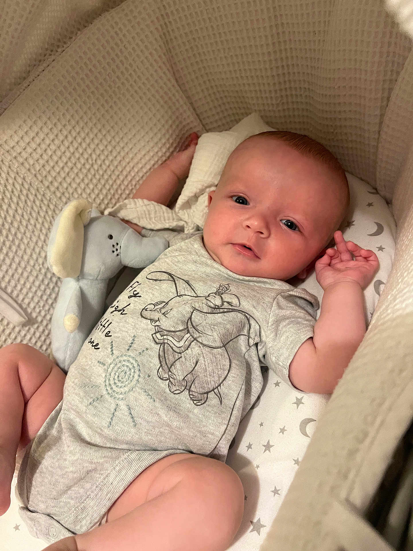 Charles is registered to the contest to win money with this photo: baby, bed, blanket, bodypart, clothing, cradle, crib, cushion, face, finger, furniture, hand, head, homedecor, infantbed, newborn, person, photography, portrait, t_shirt