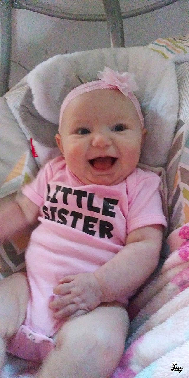 Jurnee is registered to the contest to win money with this photo: baby, baby_laughing, baby_making_funny_faces, baby_products, baby_toddler_clothing, cheek, child, face, head, lip, mouth, person, pink, product, skin, smile, toddler