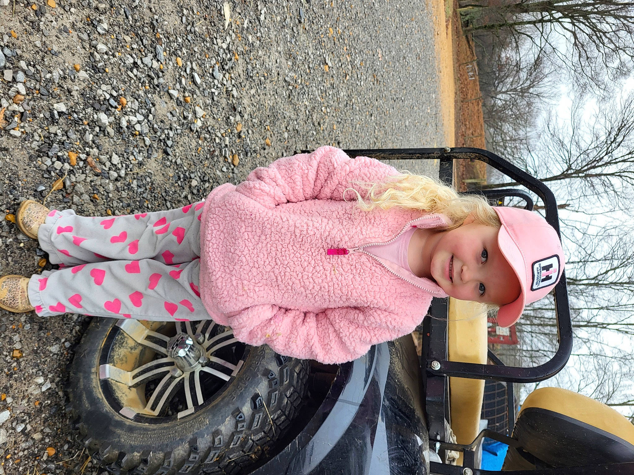 Presley joined the competition — help win amazing prizes! auto_part, automotive_exterior, automotive_lighting, automotive_tire, automotive_wheel_system, baby_carriage, baby_products, dress, fender, headwear, joy, magenta, motor_vehicle, person, pink, rim, tire, toddler, tread, tree