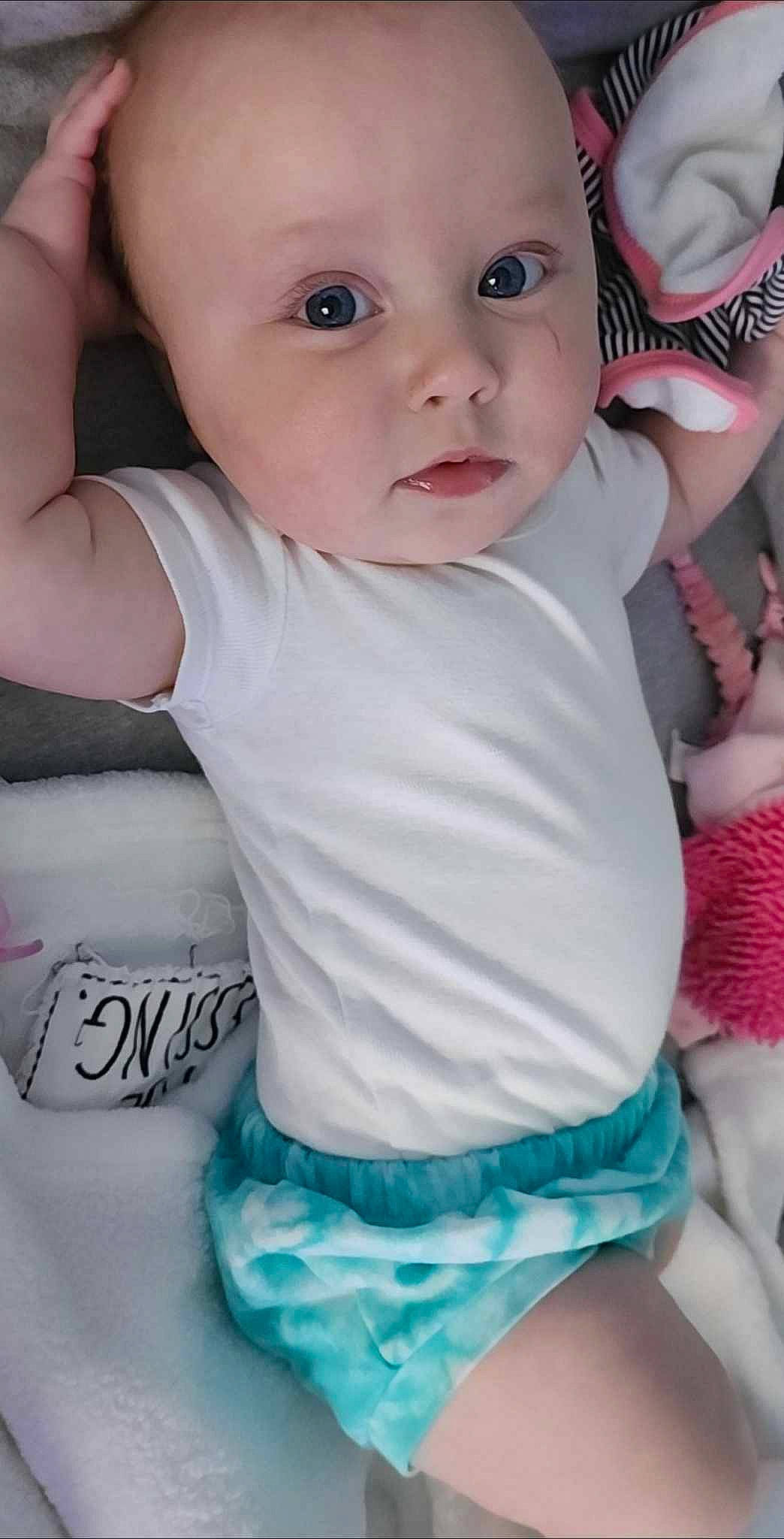 Ciara is registered to the contest to win money with this photo: baby_toddler_clothing, cheek, chin, eye, eyebrow, eyelash, face, head, human_body, iris, joint, lip, mouth, muscle, neck, organ, person, product, skin, sleeve