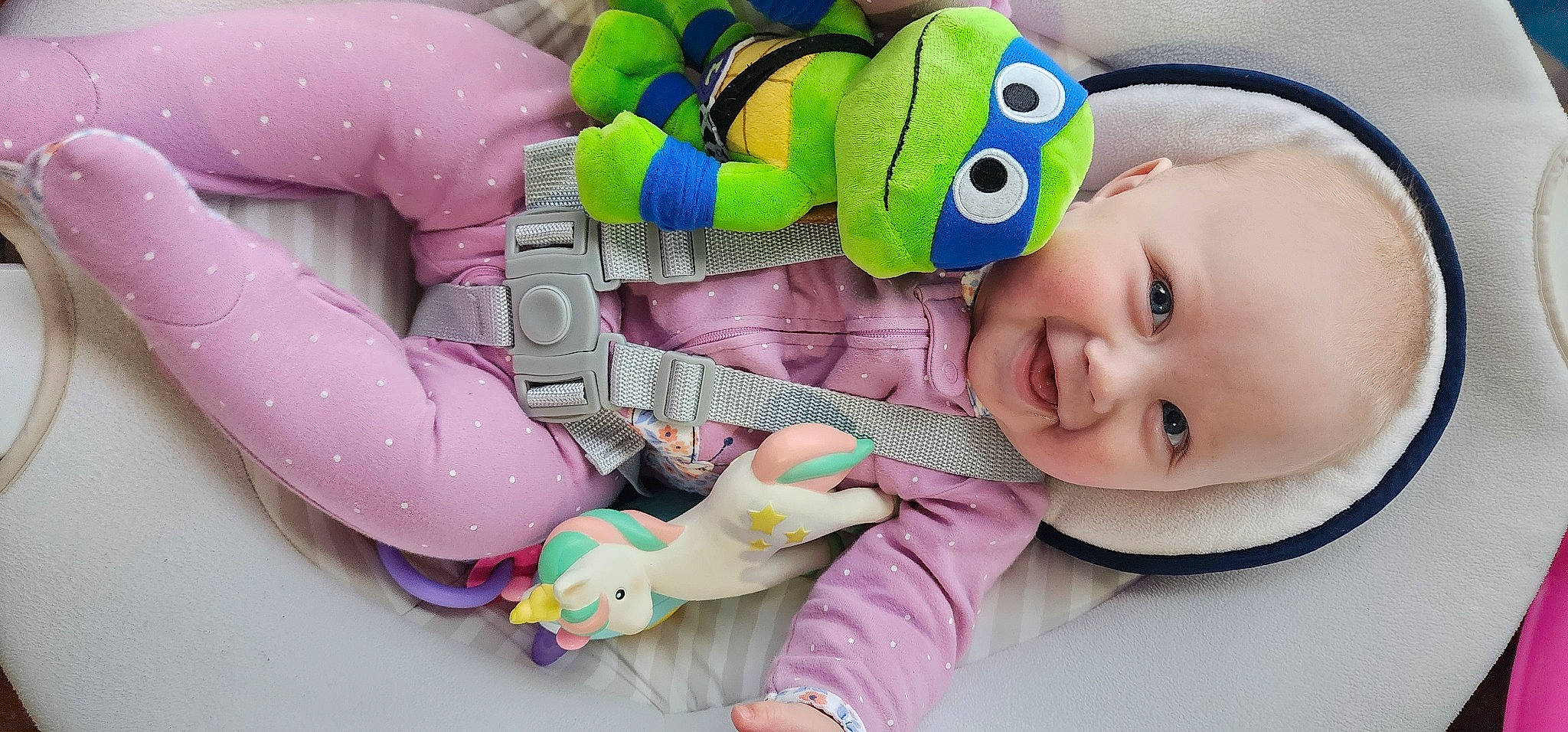 Ciara is registered to the contest to win money with this photo: baby, baby_products, baby_toddler_clothing, baby_toys, cheek, child, finger, fun, gesture, happy, joy, person, pink, product, purple, skin, smile, stuffed_toy, textile, toddler