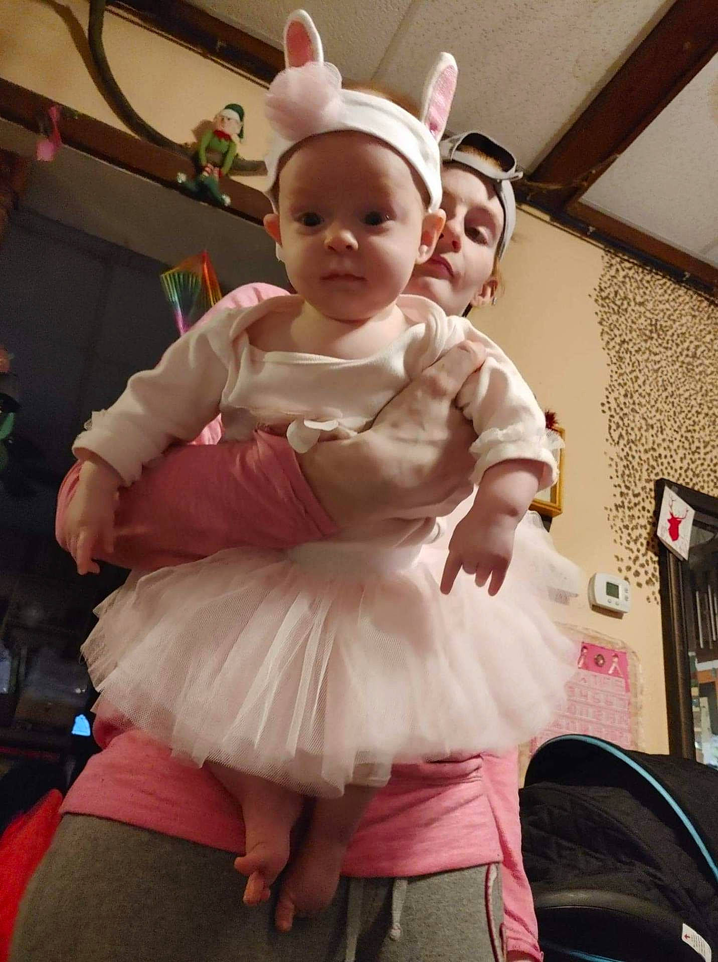 Grace Lucille Lynn Arnold is registered to the contest to win money with this photo: accessories, architecture, baby, building, clothing, costume, dancing, dress, face, glasses, hat, head, indoors, leisureactivities, pants, people, person, photography, portrait, skirt