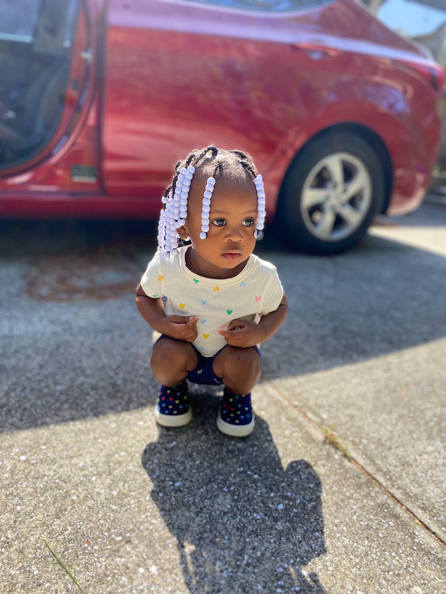 Amiracle joined the competition — help win amazing prizes! asphalt, automotive_design, automotive_exterior, automotive_lighting, automotive_tire, baby, car, hat, leisure, motor_vehicle, person, recreation, red, road, road_surface, sidewalk, tints_and_shades, tire, toddler, vehicle_door