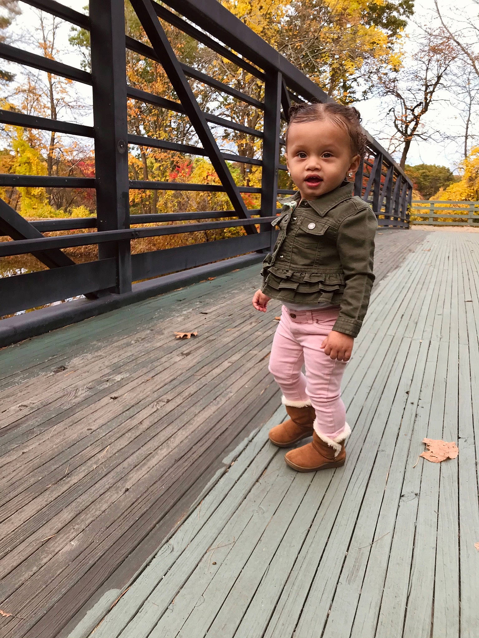 Kamaiyah joined the competition — help win amazing prizes! autumn, boardwalk, child, deck, leisure, person, smile, standing, toddler, tree, vacation, walkway, wood