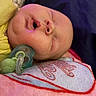 Kaiser is registered to the contest to win money with this photo: baby, blanket, child, closeup, clothing, comfort, cute, face, head, indoors, infant, mouth_open, nap, newborn, pacifier, peaceful, resting, skin, sleeping, soft_texture