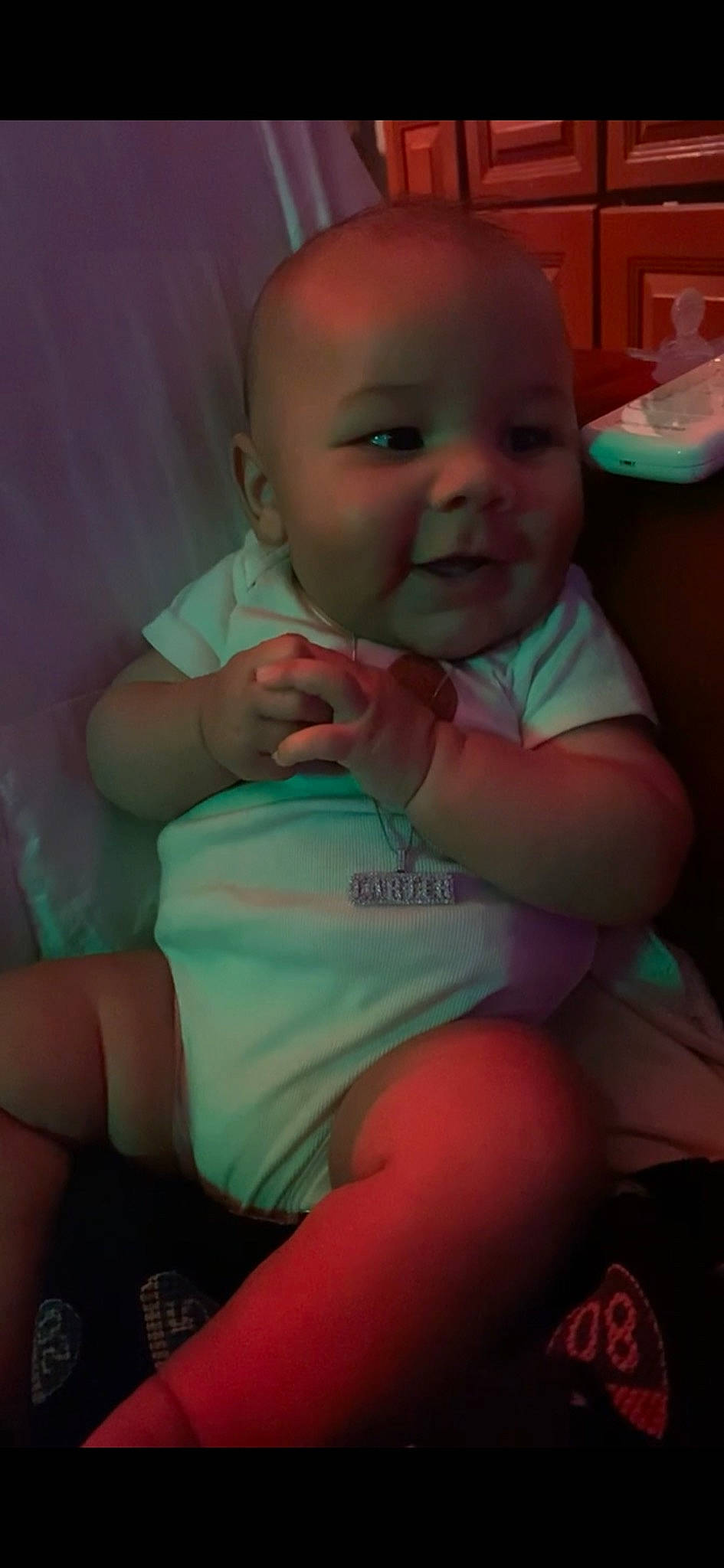 Carter joined the competition — help win amazing prizes! arm, baby_toddler_clothing, cheek, ear, eyebrow, finger, gesture, hand, happy, human_body, iris, lip, mouth, neck, nose, person, pink, purple, skin, smile