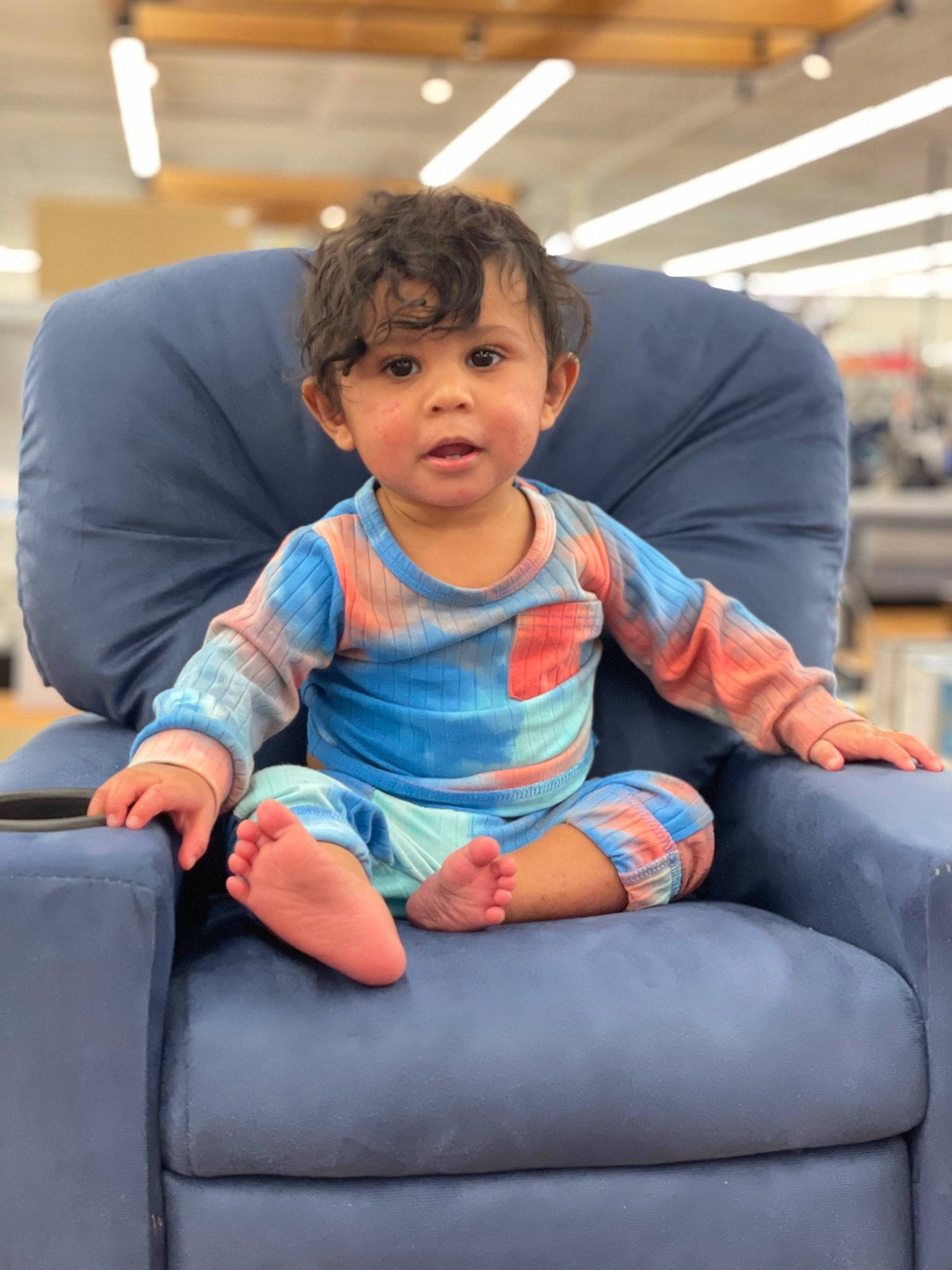 Izaiah is registered to the contest to win money with this photo: automotive_design, baby, baby_toddler_clothing, child, comfort, electric_blue, facial_expression, fashion, finger, fun, hairstyle, lap, leisure, mammal, person, product, recreation, sitting, sleeve, toddler