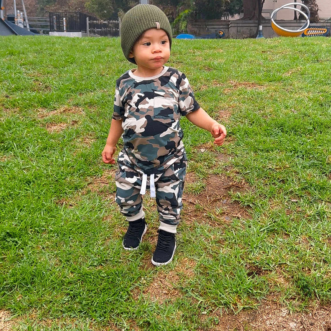 Jeremiah is registered to the contest to win money with this photo: backyard, boy, cap, child, clothing, face, grass, hat, head, male, nature, outdoors, pants, park, person, photography, plant, portrait, vegetation, yard