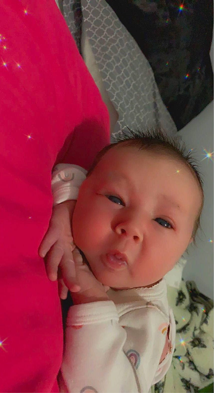 Loraline joined the competition — help win amazing prizes! baby, baby_toddler_clothing, cheek, chin, eye, eyelash, finger, gesture, hand, happy, iris, lip, mouth, nose, person, pink, skin, smile, textile, thumb