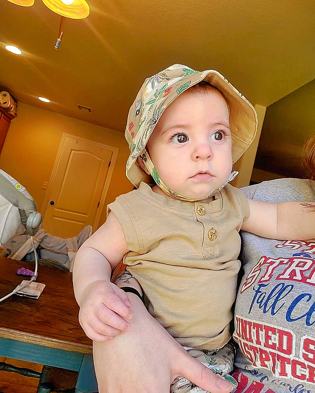 Kaden joined the competition — help win amazing prizes! arm, baby, baby_toddler_clothing, cap, chair, child, fashion_accessory, finger, fun, happy, hat, headgear, headwear, jewellery, pattern, person, personal_protective_equipment, play, sitting, sleeve