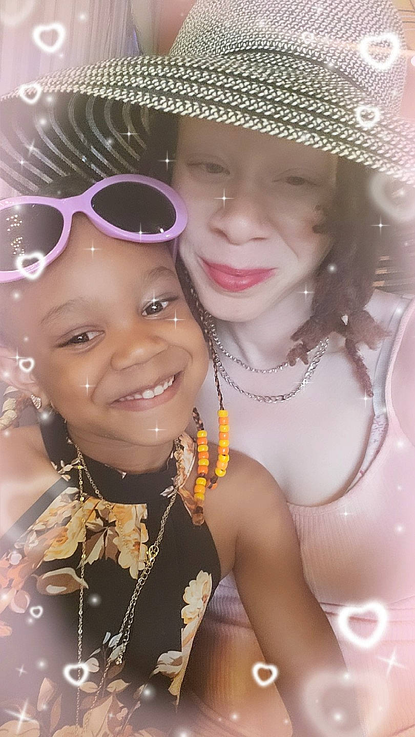 Harley is registered to the contest to win money with this photo: black_hair, body_jewelry, cool, eyebrow, eyelash, face, facial_expression, flash_photography, fun, hairstyle, happy, hat, headgear, headwear, joy, lip, person, photograph, pink, skin